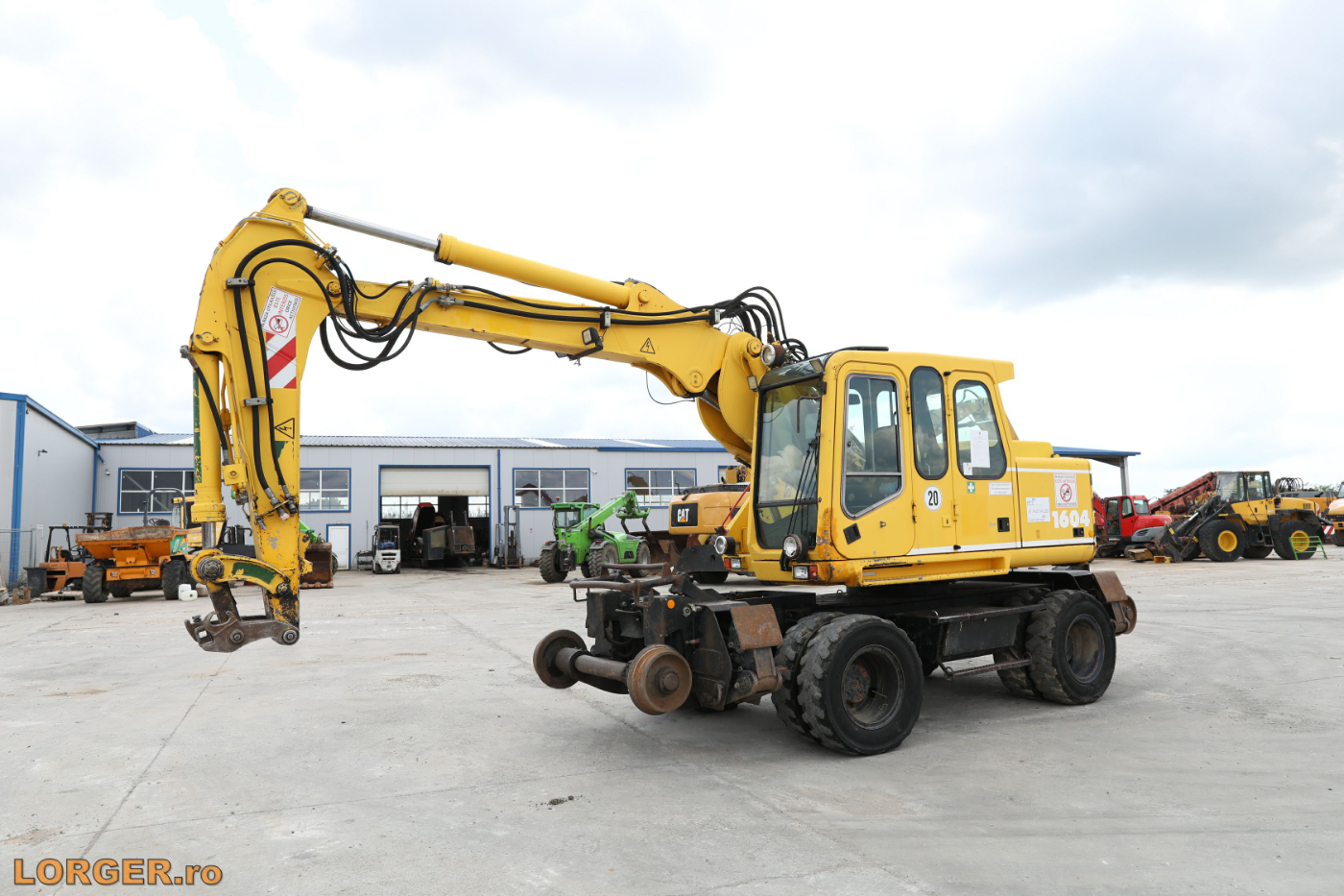 Excavator pe pneuri Atlas Terex 1604